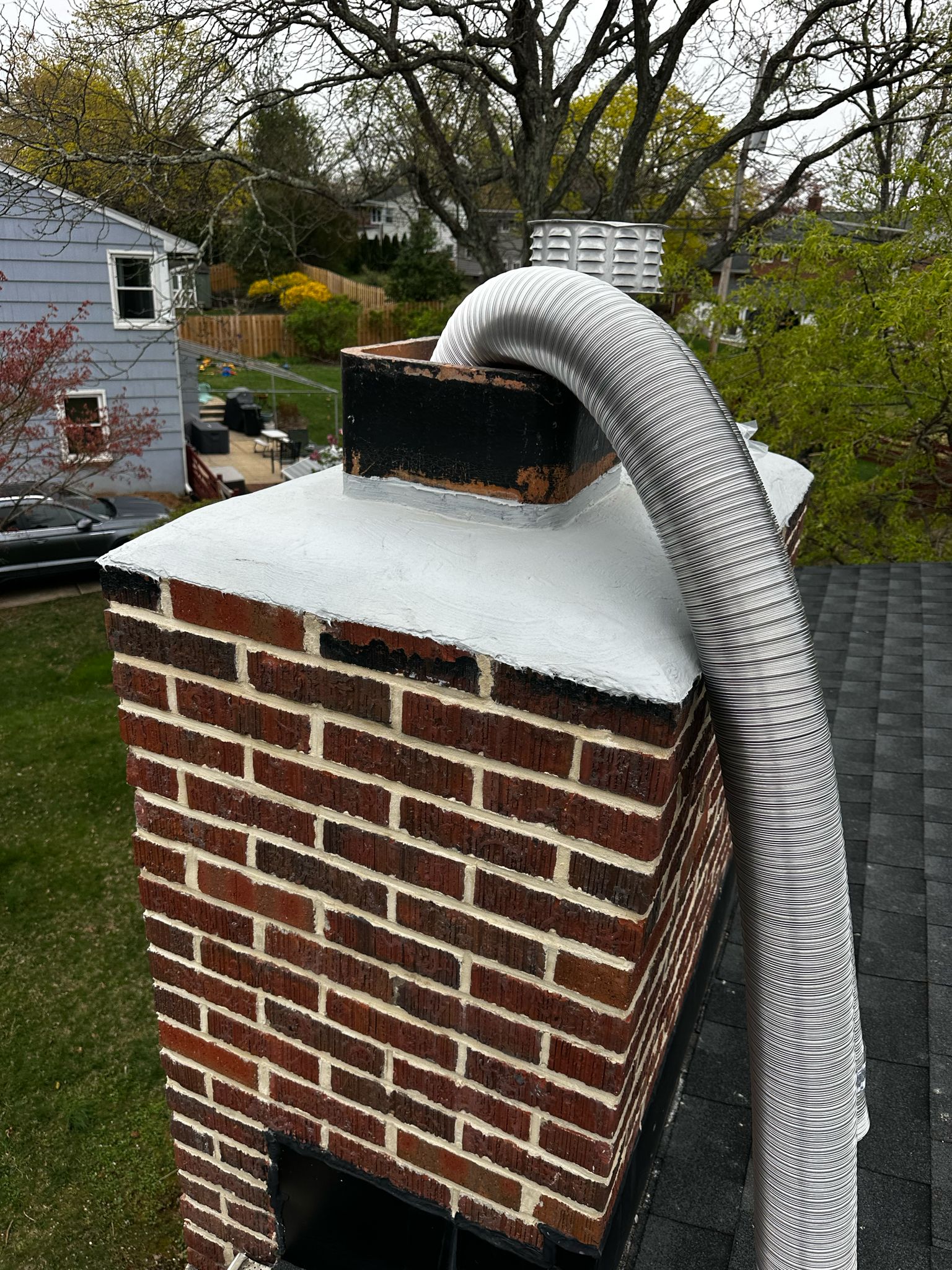 White brick chimney with cap